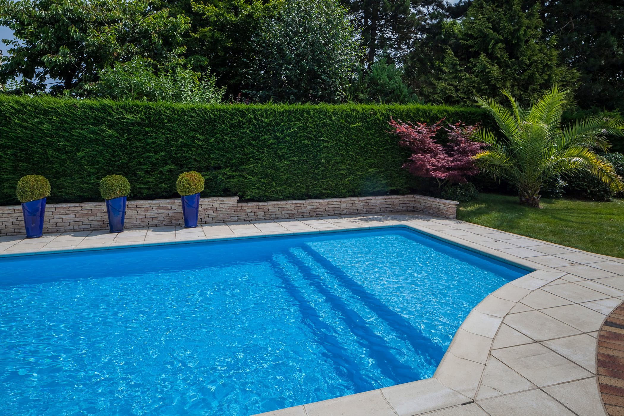 Piscine Magiline avec escalier d'angle